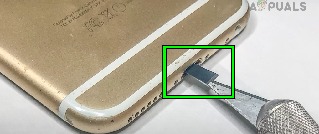 Insert a Piece of Tape Inside the Charging Port of the iPad