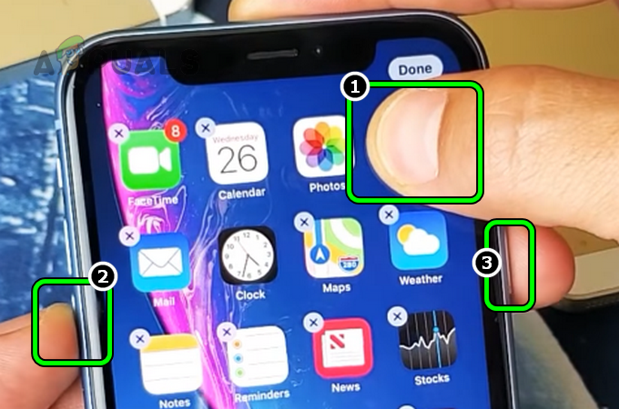 Press and Hold the Camera Icon, Volume Down, and the Power Buttons of Your iPhone