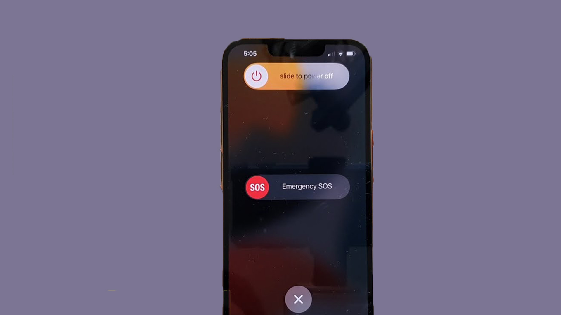 move the power slider to power your iPhone off