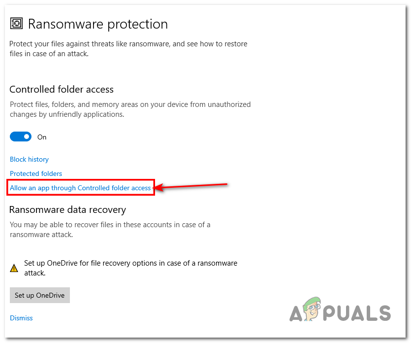 Navigating to the Ransomware protection settings and clicking on the "Allow an app through controlled folder accesss"