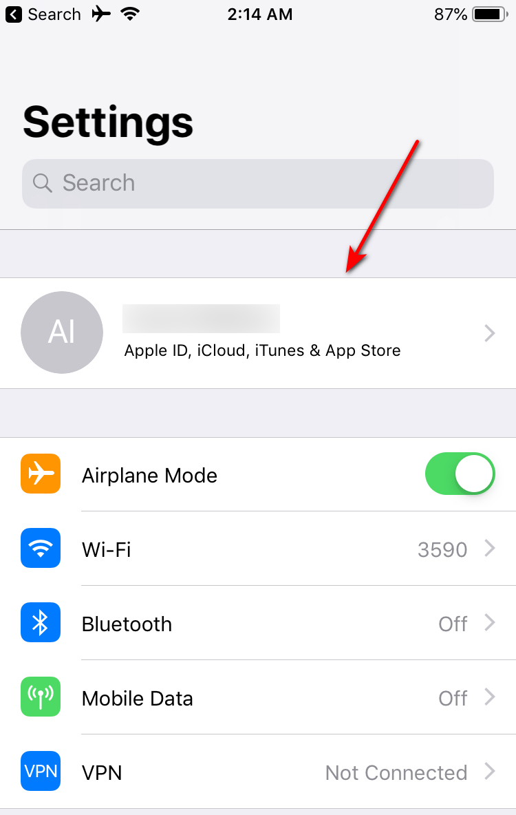 Locate and tap on your Apple ID.