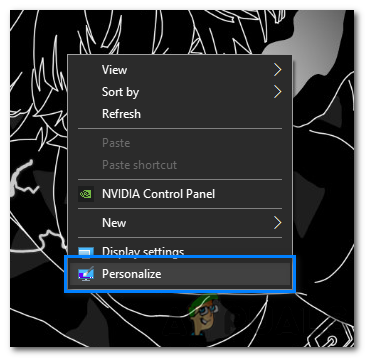 Right-click on the desktop and select "Personalize".