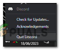 Right-click on the Discord icon in the system tray and choose "Quit Discord".